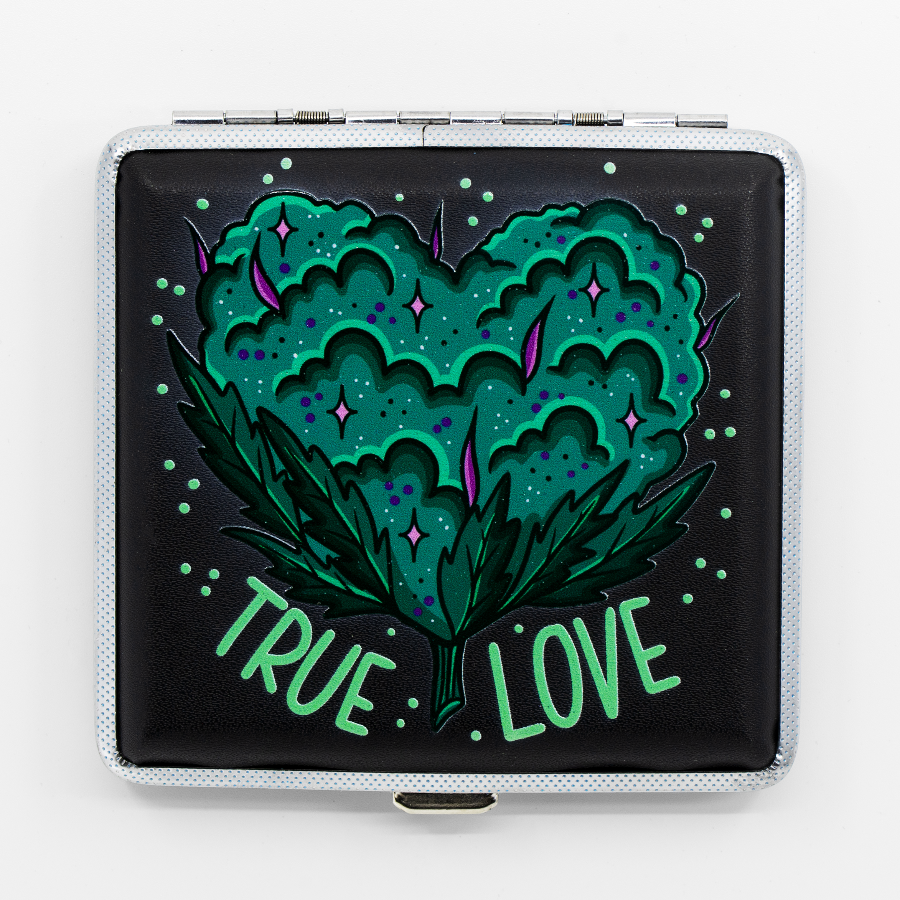 Black hard-shell smell-proof square stash case with "True Love" leaf design and silver hardware on a white background