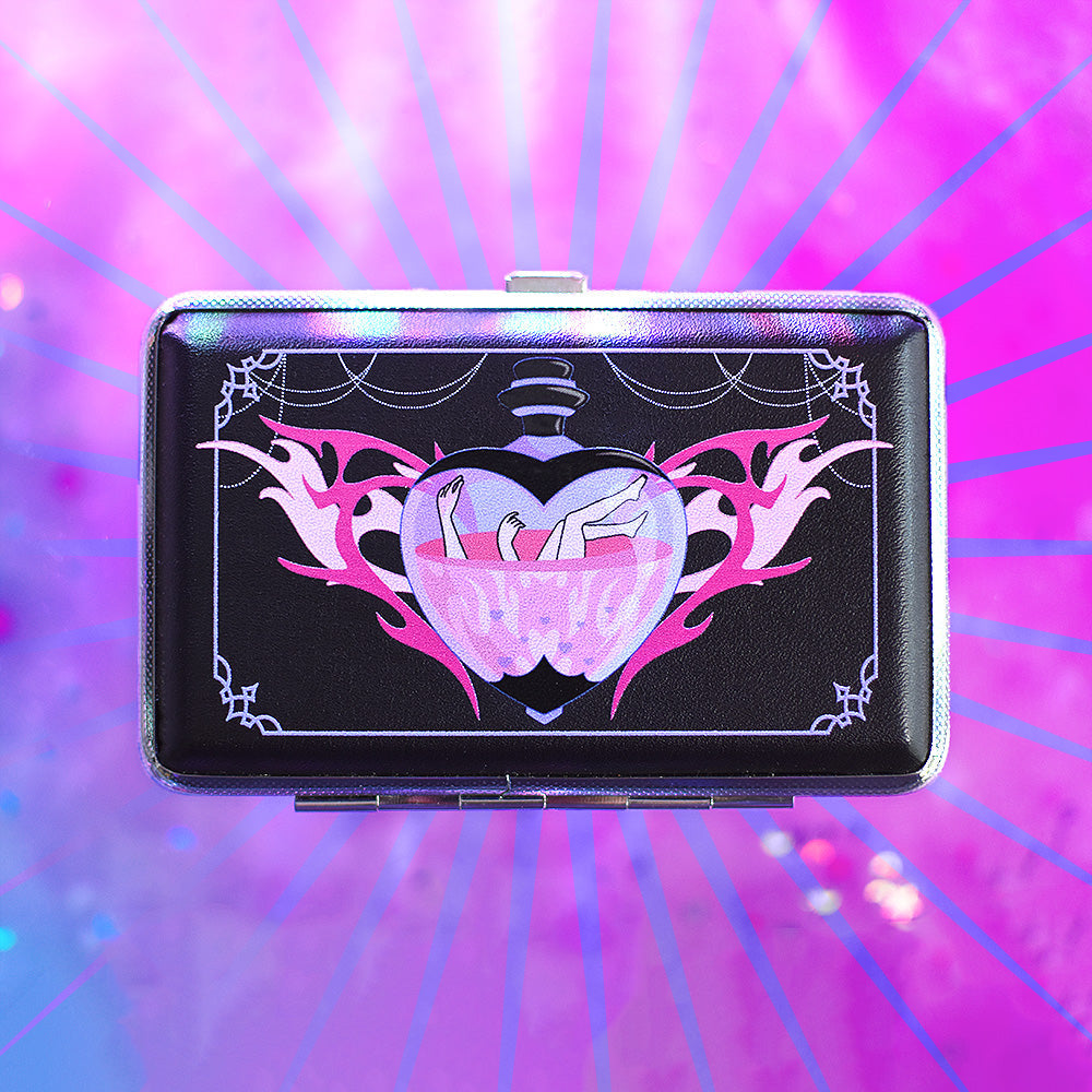 Hard shell smell-proof stash box with pink heart love potion and hands and legs graphic on black case